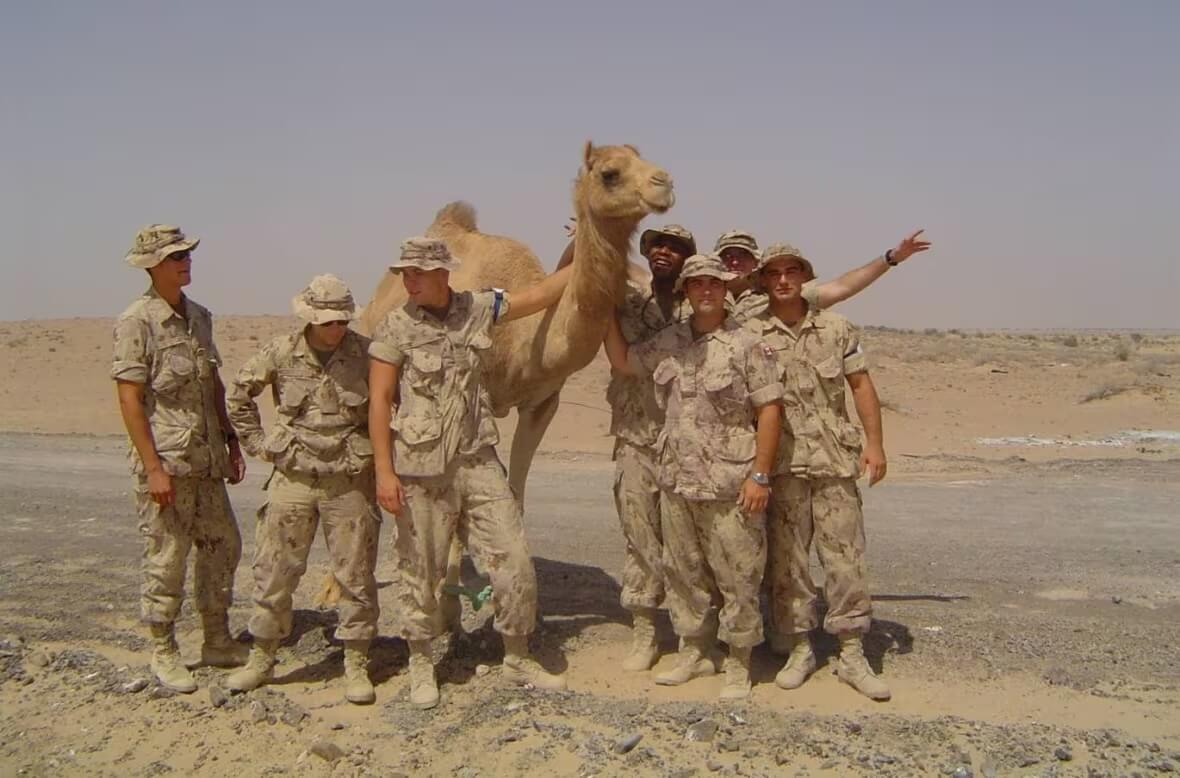 Lodge, second from the left, stands with some of his unit members outside Dubai, where they were deployed in support of Canada's mission to Afghanistan.