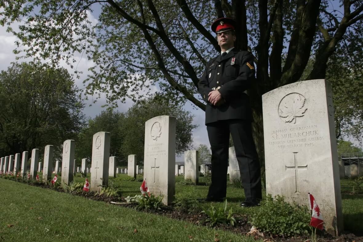 Lodge on a visit to Groesbeek Canadian War Cemetery in the Netherlands, where members of his unit were buried after they died during the Second World War.