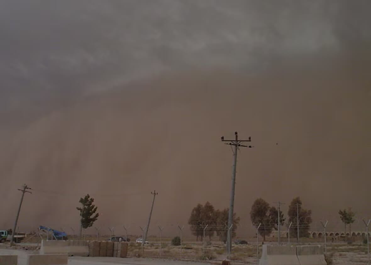 A sandstorm dominates the sky before enveloping Kandahar Airfield.